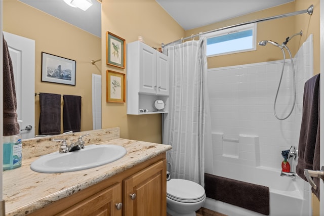 full bathroom with shower / bath combo, vanity, and toilet