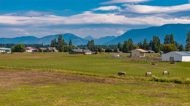 view of mountain feature with a rural view