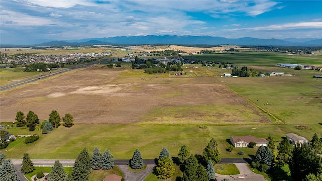 bird's eye view with a rural view and a mountain view