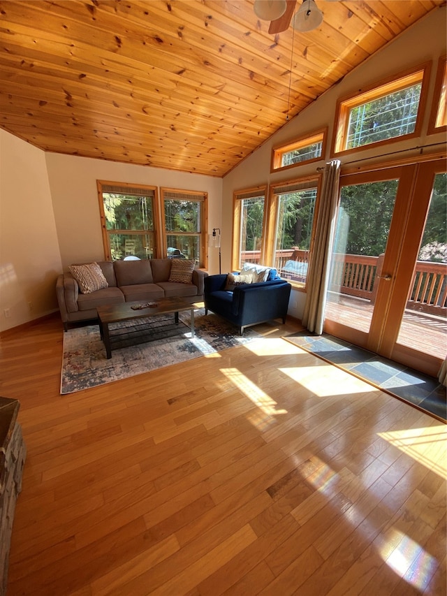 unfurnished living room with wooden ceiling, high vaulted ceiling, light hardwood / wood-style flooring, and ceiling fan