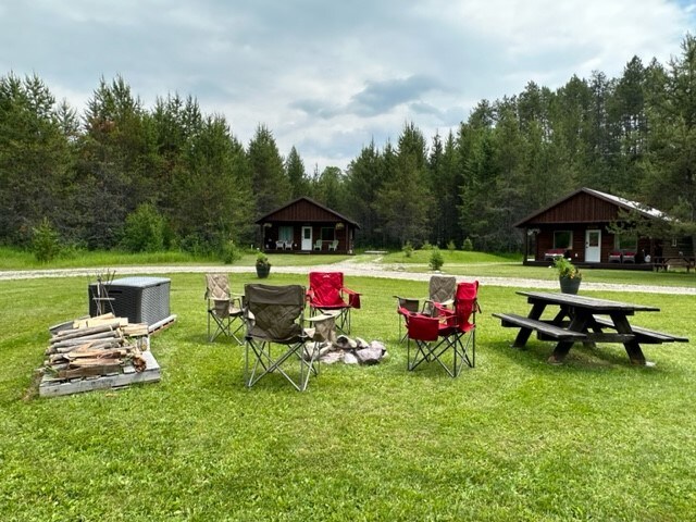 view of property's community with a lawn