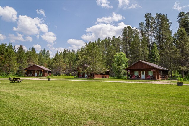 view of community featuring a yard