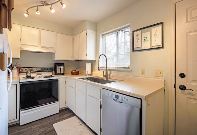 kitchen with dark wood-type flooring, electric stove, dishwasher, sink, and white cabinetry