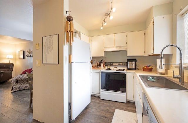 kitchen featuring dark wood-type flooring, white cabinetry, white appliances, and sink