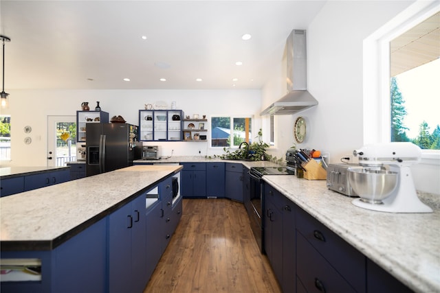 965 Ksanka Foothills Rd, Eureka, MT 59917 - kitchen featuring blue cabinets, black appliances, open shelves, and wall chimney exhaust hood