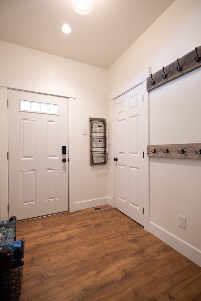 965 Ksanka Foothills Rd, Eureka, MT 59917 - entrance foyer with baseboards, wood finished floors, and recessed lighting