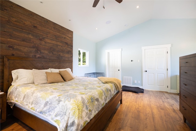 965 Ksanka Foothills Rd, Eureka, MT 59917 - bedroom featuring lofted ceiling, baseboards, visible vents, a ceiling fan, and wood finished floors