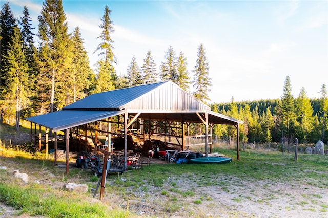 965 Ksanka Foothills Rd, Eureka, MT 59917 - view of outdoor structure featuring a view of trees