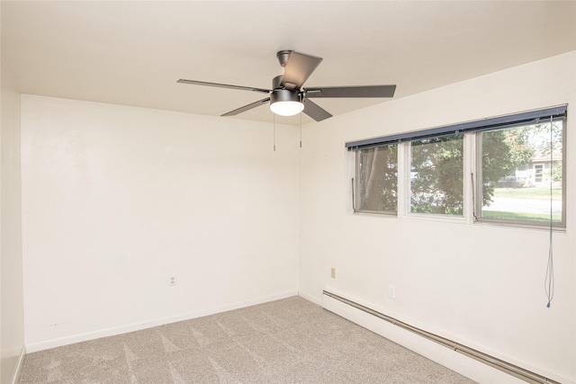 empty room with baseboards, a baseboard radiator, ceiling fan, and light colored carpet