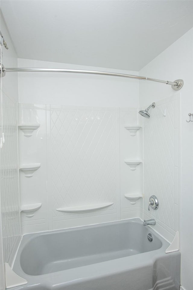 bathroom with shower / tub combination