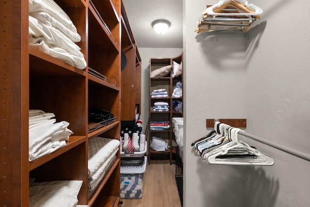 1320 W Lakeshore Dr, Whitefish, MT 59937 - walk in closet featuring wood finished floors