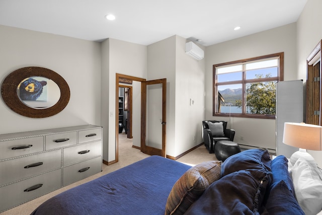 bedroom with a wall unit AC, a baseboard radiator, and light colored carpet