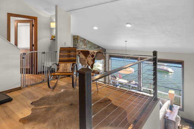 game room with lofted ceiling and hardwood / wood-style flooring