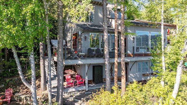 1320 W Lakeshore Dr, Whitefish, MT 59937 - back of house with a wooden deck