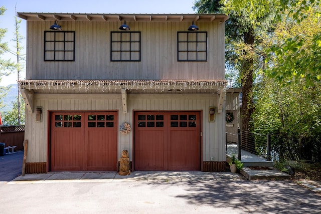 1320 W Lakeshore Dr, Whitefish, MT 59937 - view of front of house featuring an attached garage