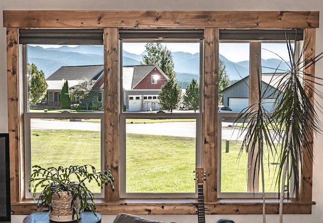 entryway featuring a mountain view and a healthy amount of sunlight