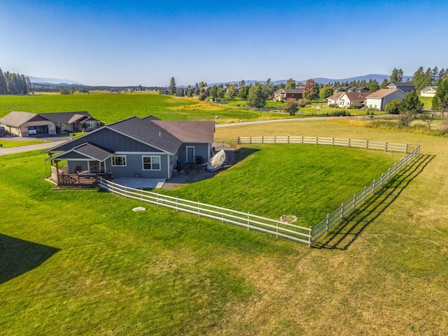 birds eye view of property featuring a rural view