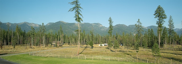 mountain view featuring a rural view