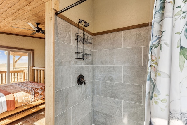 bathroom featuring ceiling fan, wood ceiling, and a shower with shower curtain