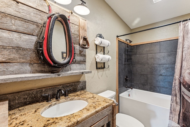 full bathroom with shower / bath combo, vanity, and toilet