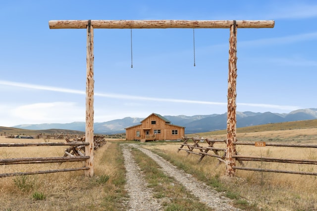 view of road with a mountain view and a rural view