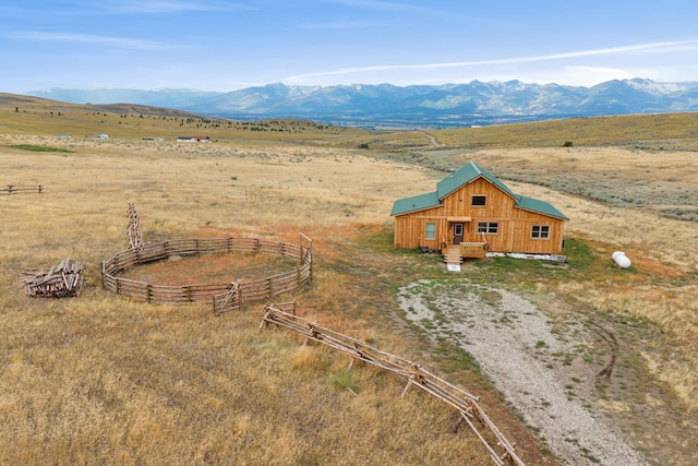 bird's eye view with a mountain view and a rural view