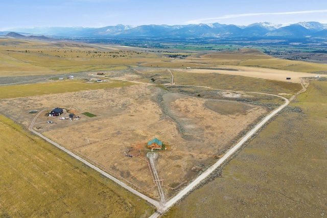 bird's eye view with a mountain view and a rural view