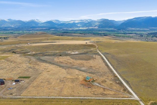 bird's eye view featuring a mountain view and a rural view