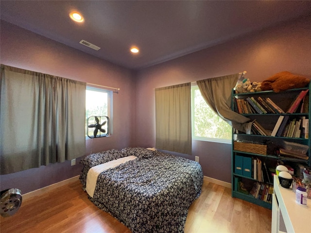 bedroom featuring light hardwood / wood-style floors