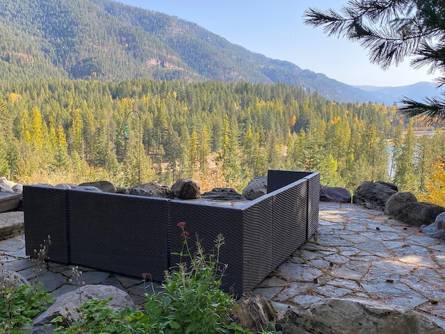 mountain view featuring a wooded view