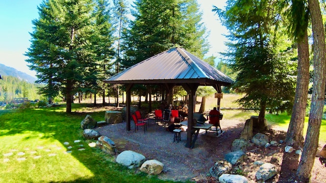 view of home's community with a gazebo and a lawn