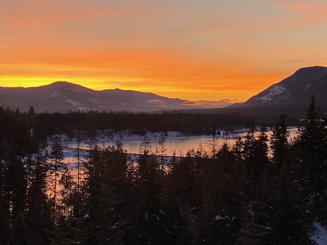 2 Rainbow Ct, Noxon, MT 59853 - view of mountain backdrop featuring a nearby body of water and a forest