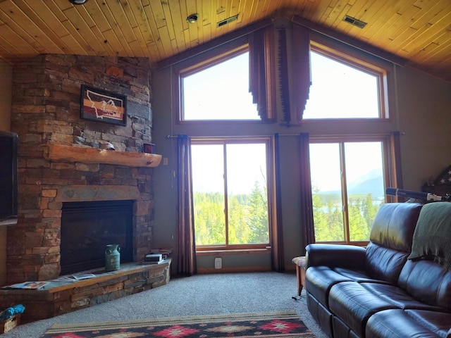 2 Rainbow Ct, Noxon, MT 59853 - carpeted living room with vaulted ceiling, healthy amount of natural light, wood ceiling, and a fireplace
