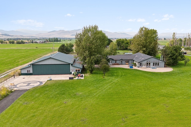 aerial view featuring a rural view and a mountain view