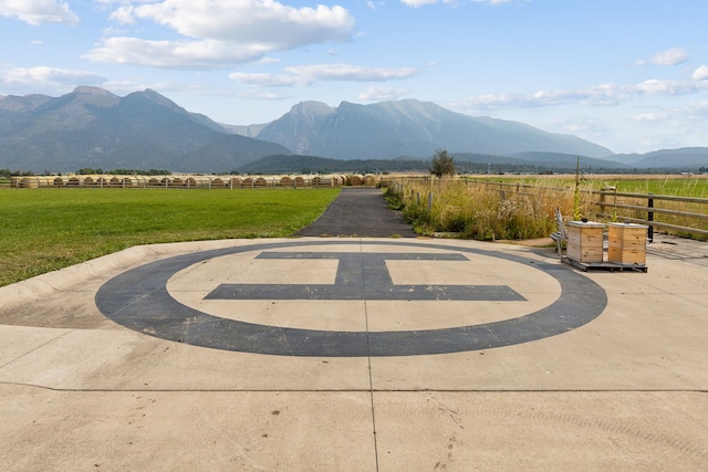 view of mountain feature with a rural view