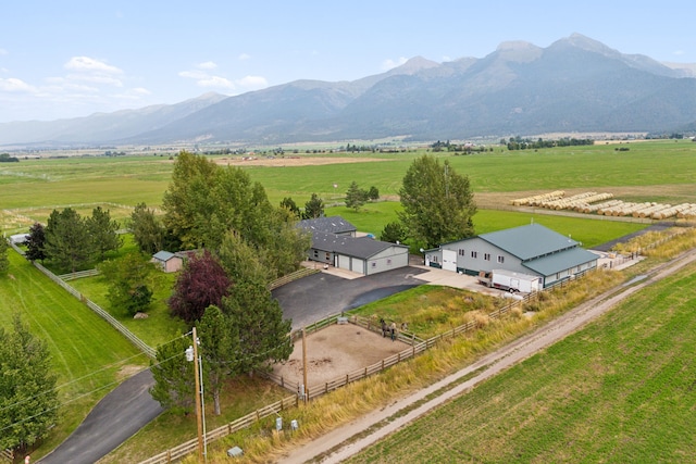 aerial view with a mountain view and a rural view