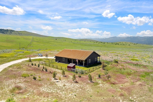 birds eye view of property featuring a rural view and a mountain view