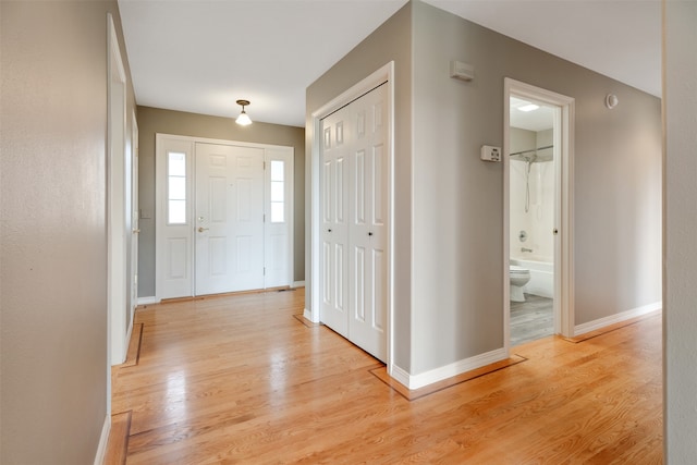 entryway with light wood-type flooring