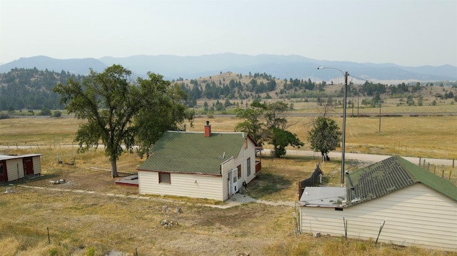 aerial view featuring a mountain view and a rural view