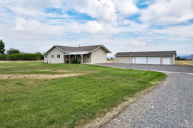 ranch-style home with a front lawn