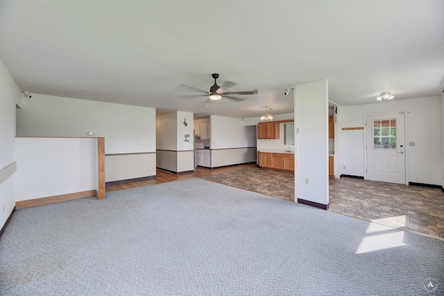 unfurnished room with ceiling fan and hardwood / wood-style flooring