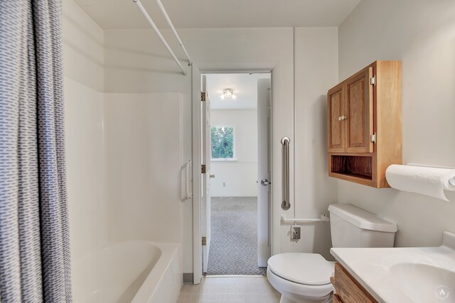 full bathroom featuring vanity, toilet, and shower / tub combo