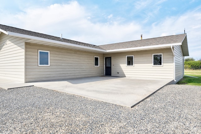 back of property featuring a patio area