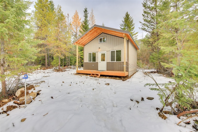 view of snow covered house