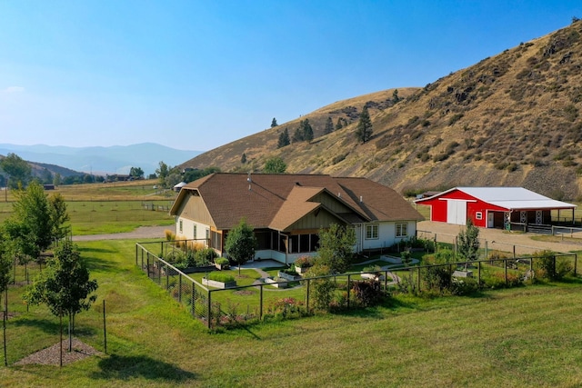 view of mountain feature with a rural view