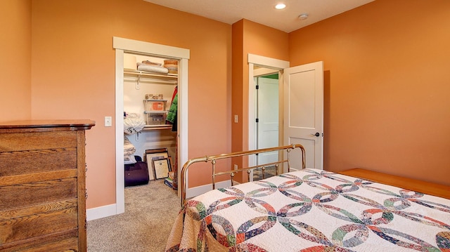 carpeted bedroom featuring a closet