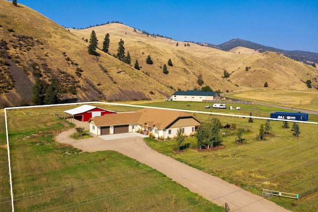 view of mountain feature with a rural view