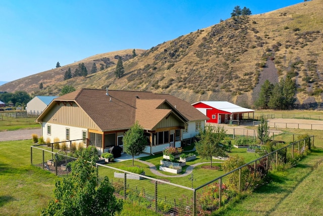 view of mountain feature with a rural view