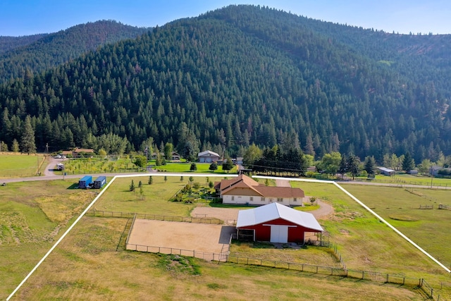 birds eye view of property featuring a rural view and a mountain view