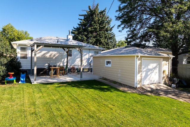 back of property featuring a lawn and a patio area